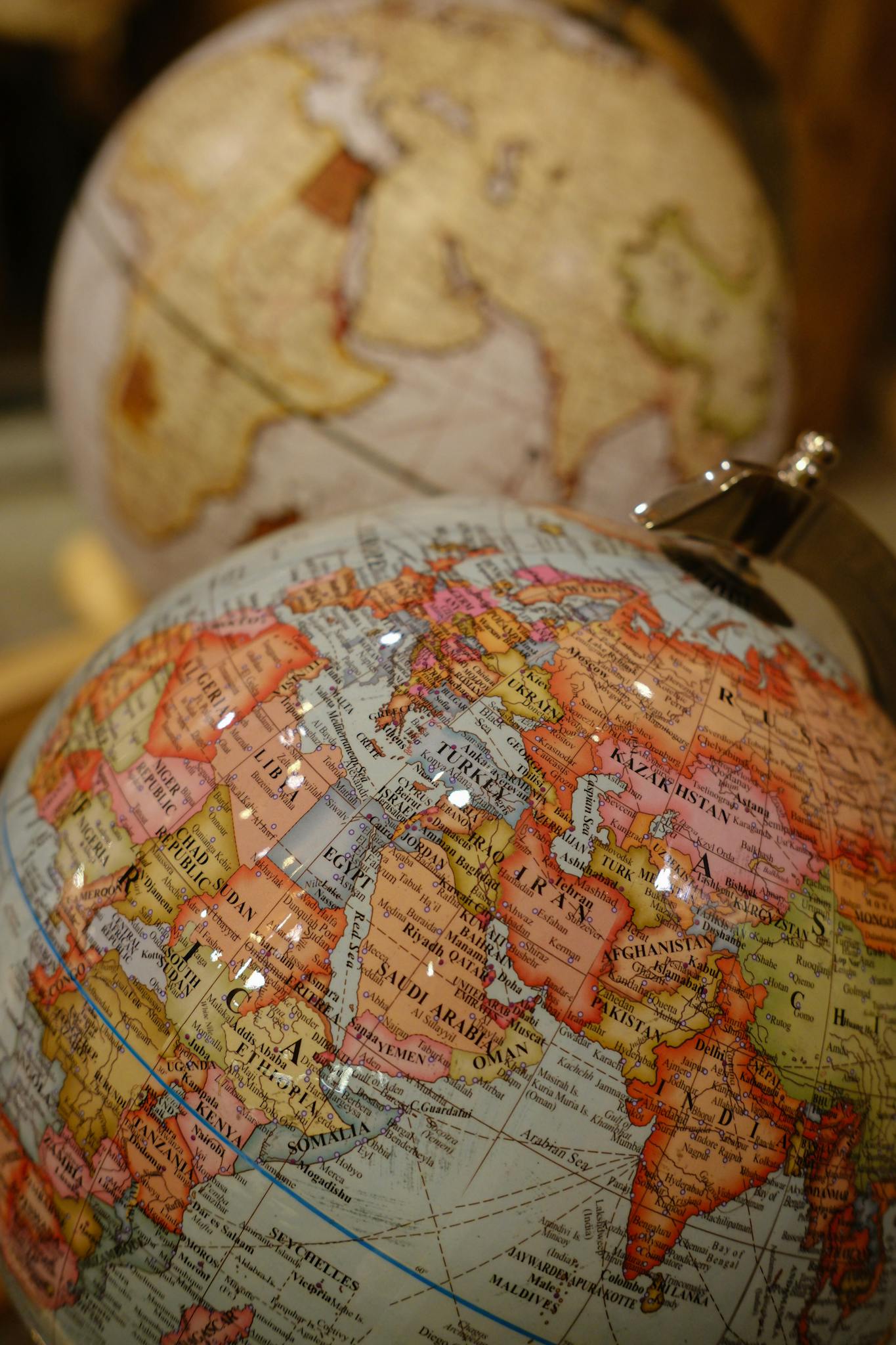 A detailed globe showing continents and countries with focus on Africa and Europe.